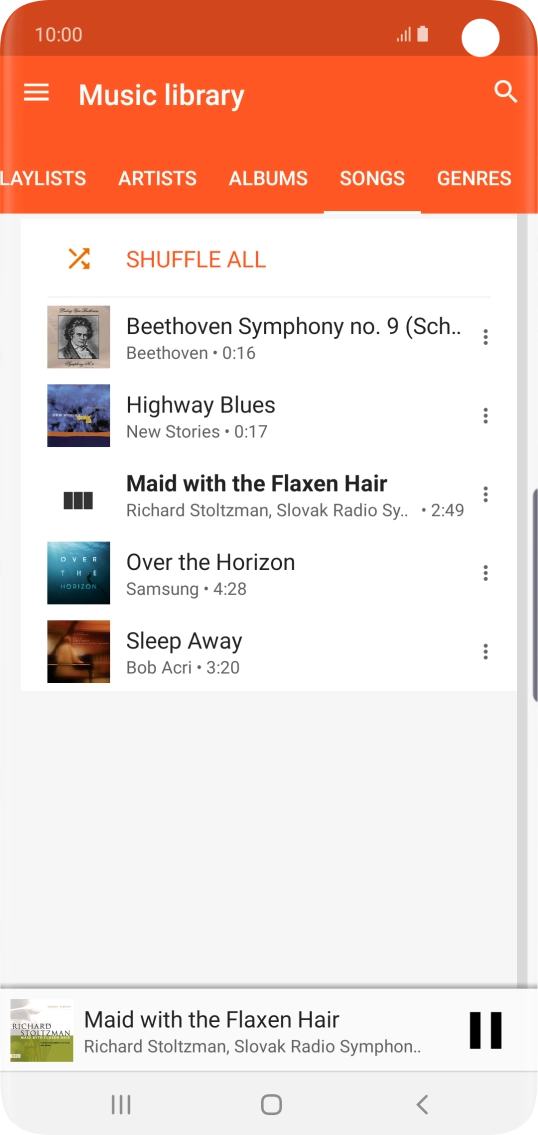 Press the song title at the bottom of the screen.