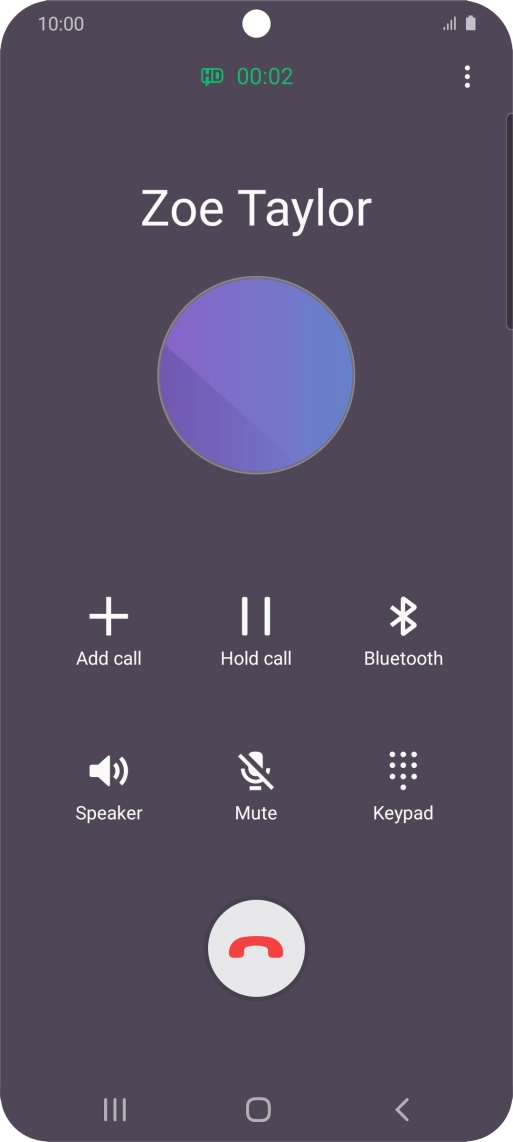 Press the end call icon.
