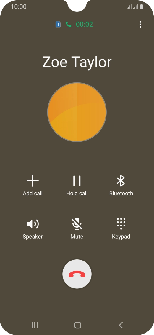 Press the end call icon.