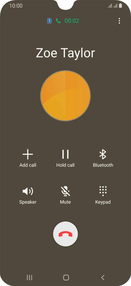 Press the end call icon.