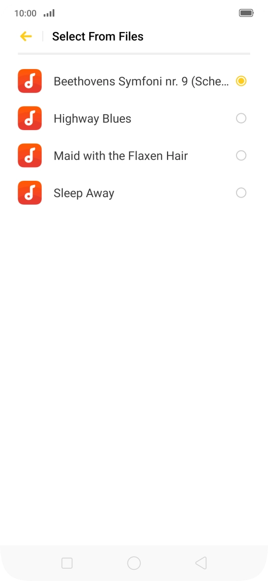 Once you've found a ring tone you like, press arrow left.