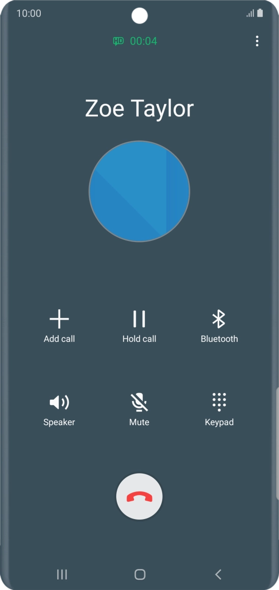 Press the end call icon.