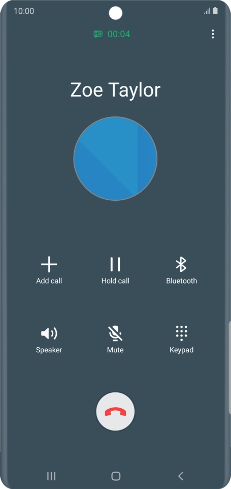 Press the end call icon.