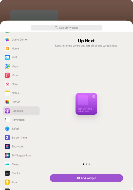 Slide your finger right or left on the screen to select the required widget size.