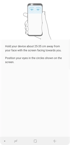 Follow the instructions on the screen to create the phone lock code using iris scanning.