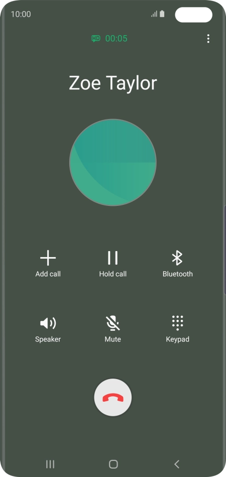 Press the end call icon.