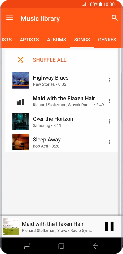 Press the song title at the bottom of the screen.