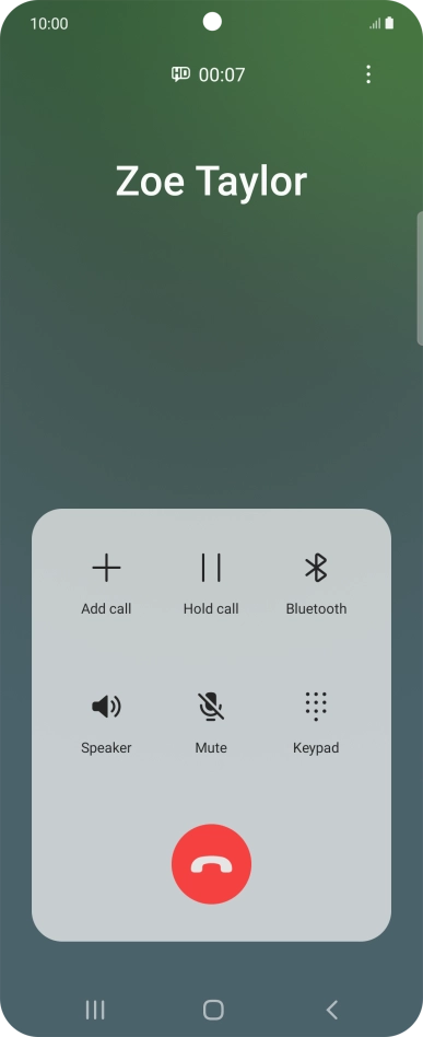 Press the end call icon.