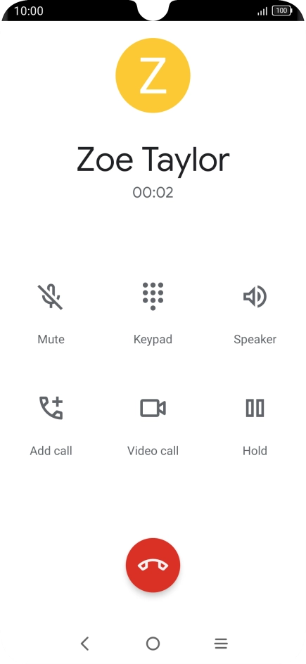 Press the end call icon.