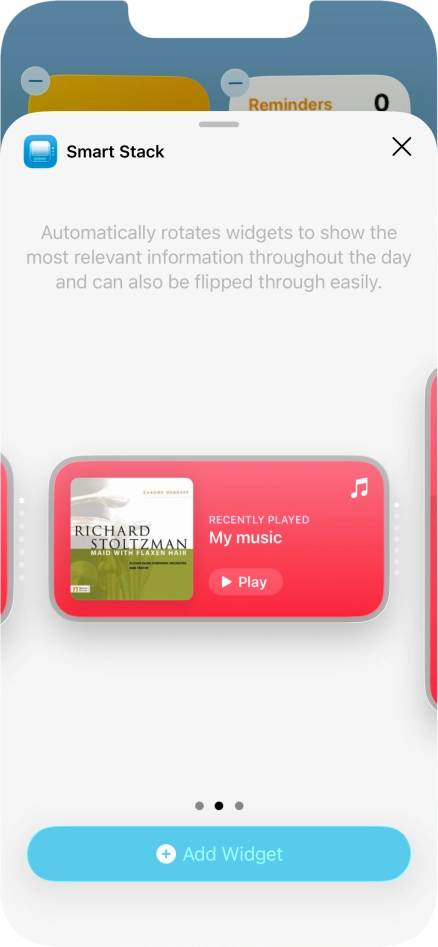 Slide your finger right or left on the screen to select the required widget size.