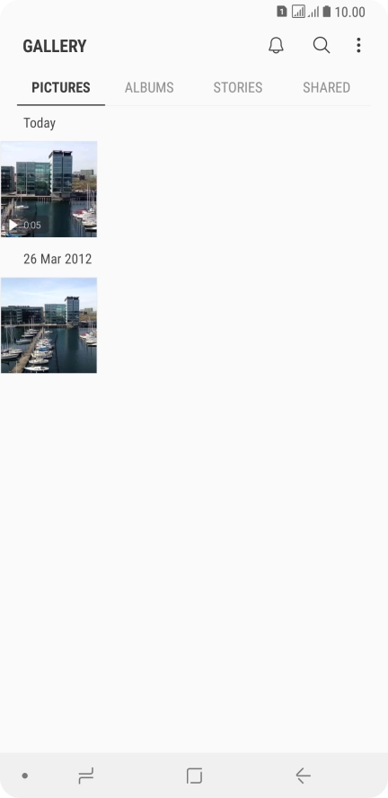 Press ALBUMS and go to the required folder.