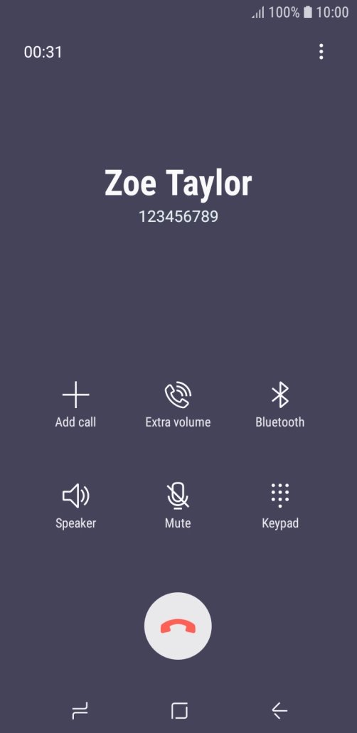 Press the end call icon.