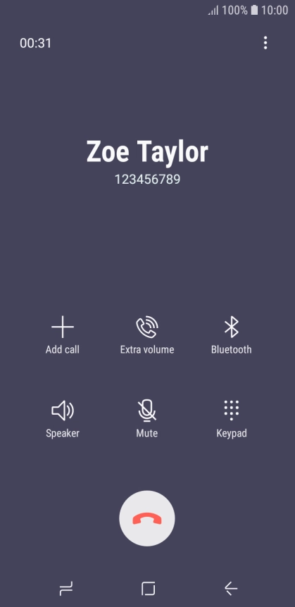 Press the end call icon.
