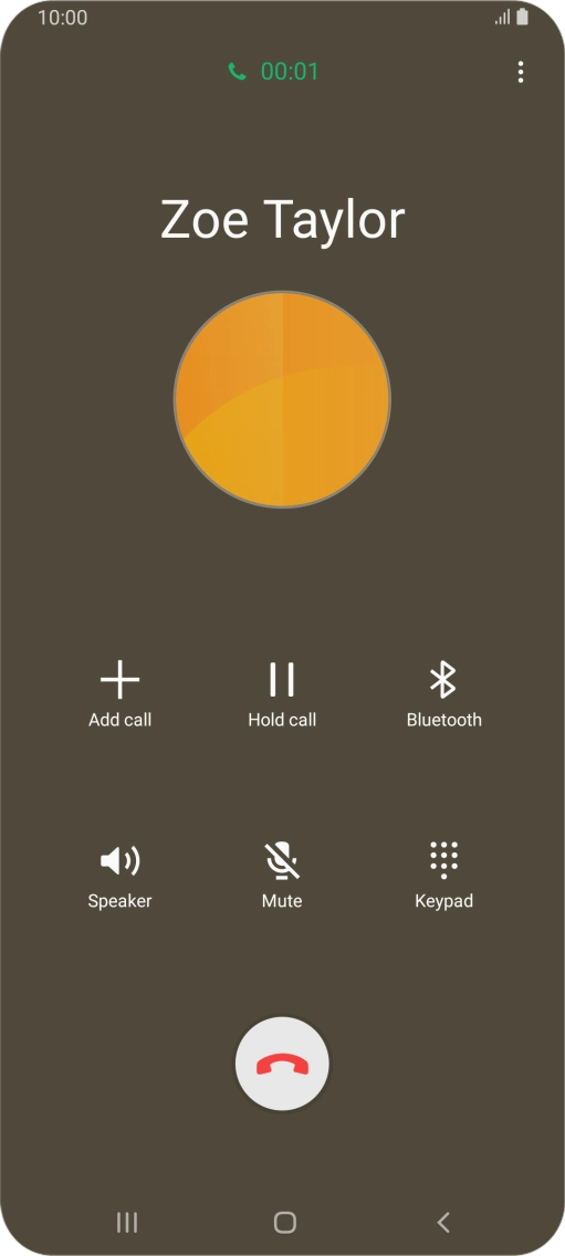 Press the end call icon.