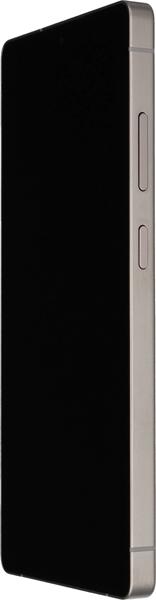 Press and hold the Side key until your phone is turned on.