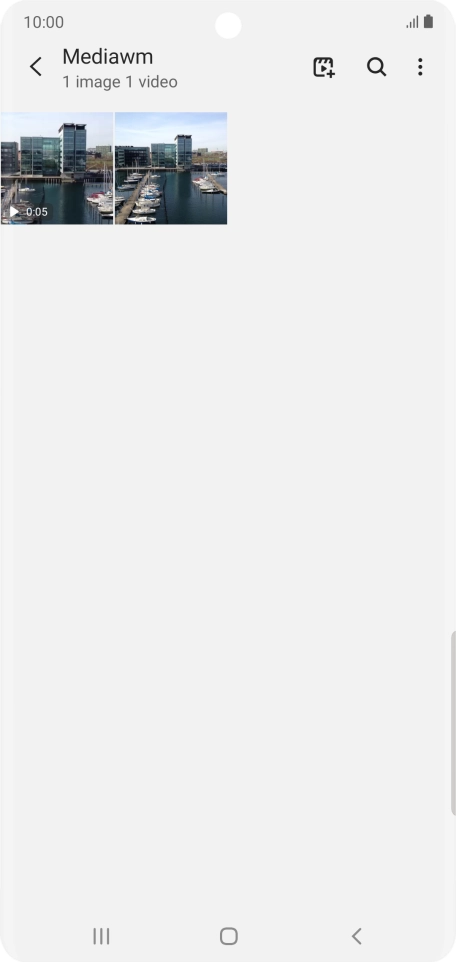 Press and hold any picture or video clip.
