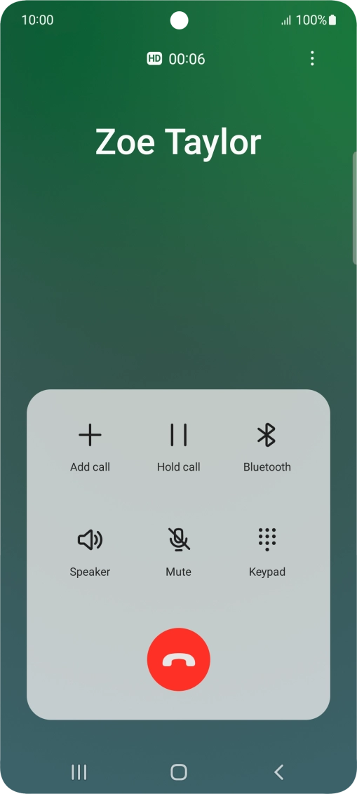 Press the end call icon.