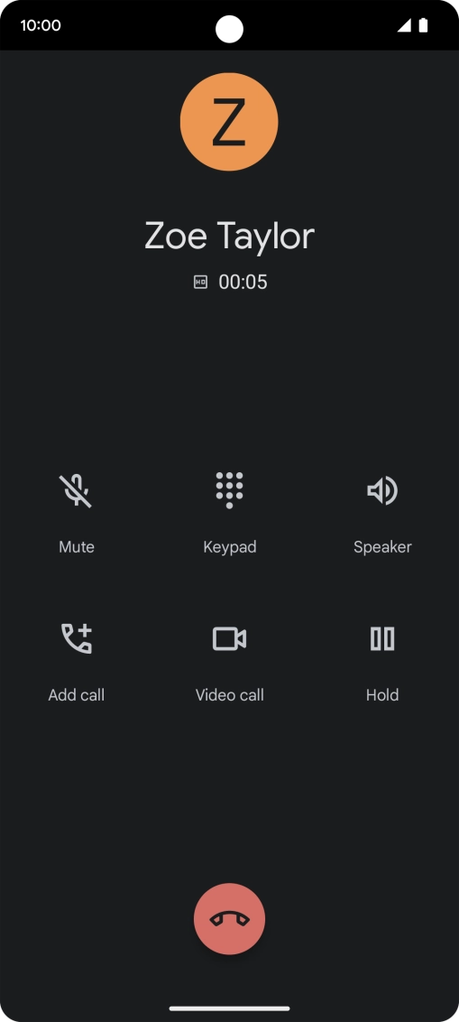 Press the end call icon.
