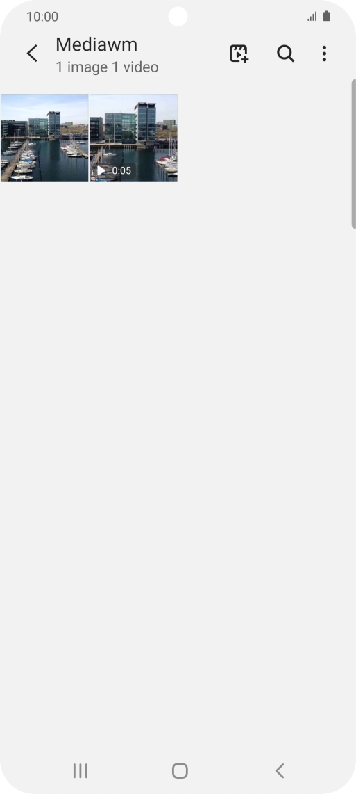 Press and hold any picture or video clip.