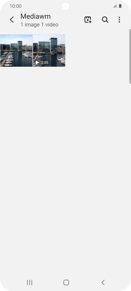 Press and hold any picture or video clip.