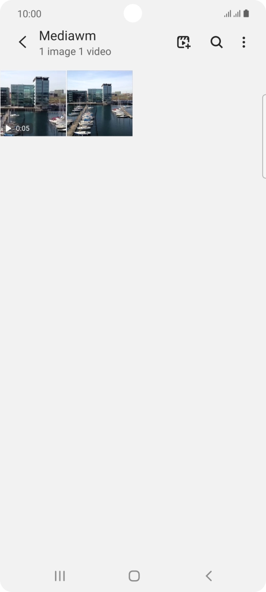 Press and hold any picture or video clip.