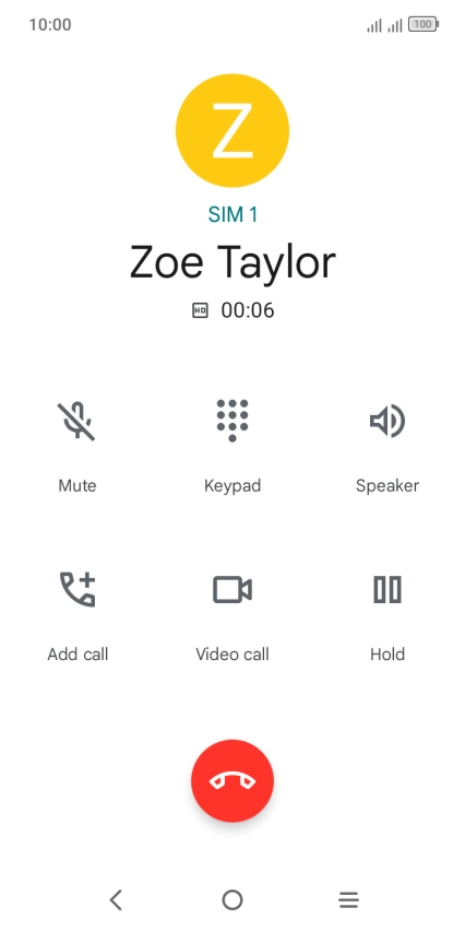 Press the end call icon.