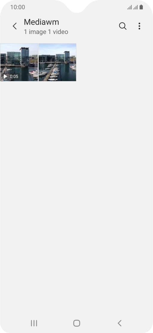 Press and hold any picture or video clip.