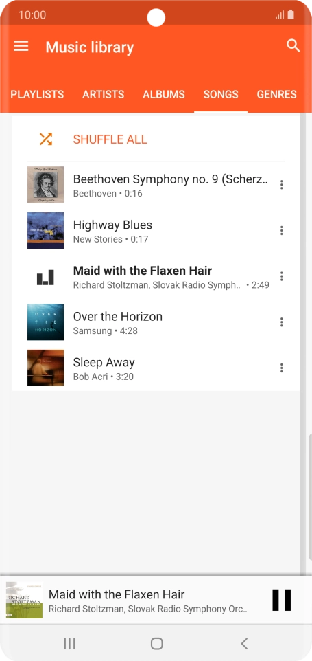 Press the song title at the bottom of the screen.