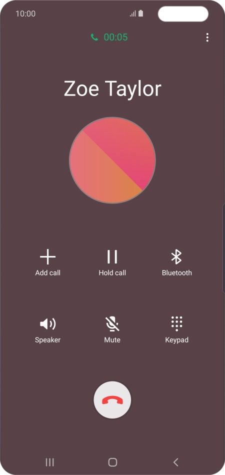 Press the end call icon.