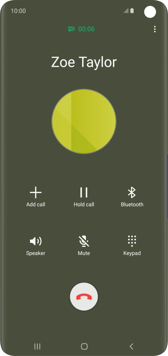 Press the end call icon.