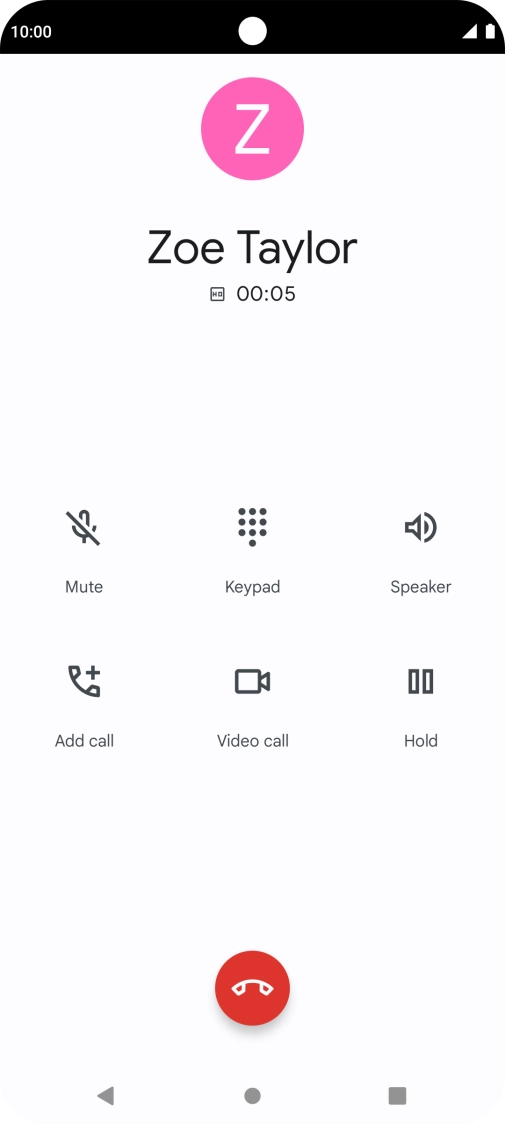 Press the end call icon.