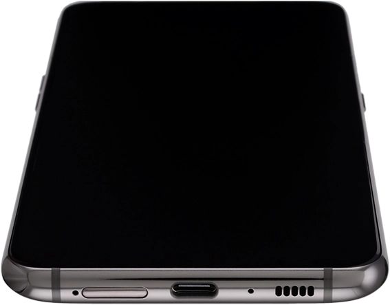 Insert the opener into the small hole in the SIM holder.