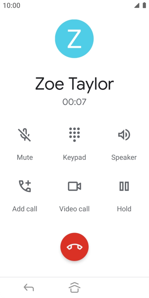 Press the end call icon.