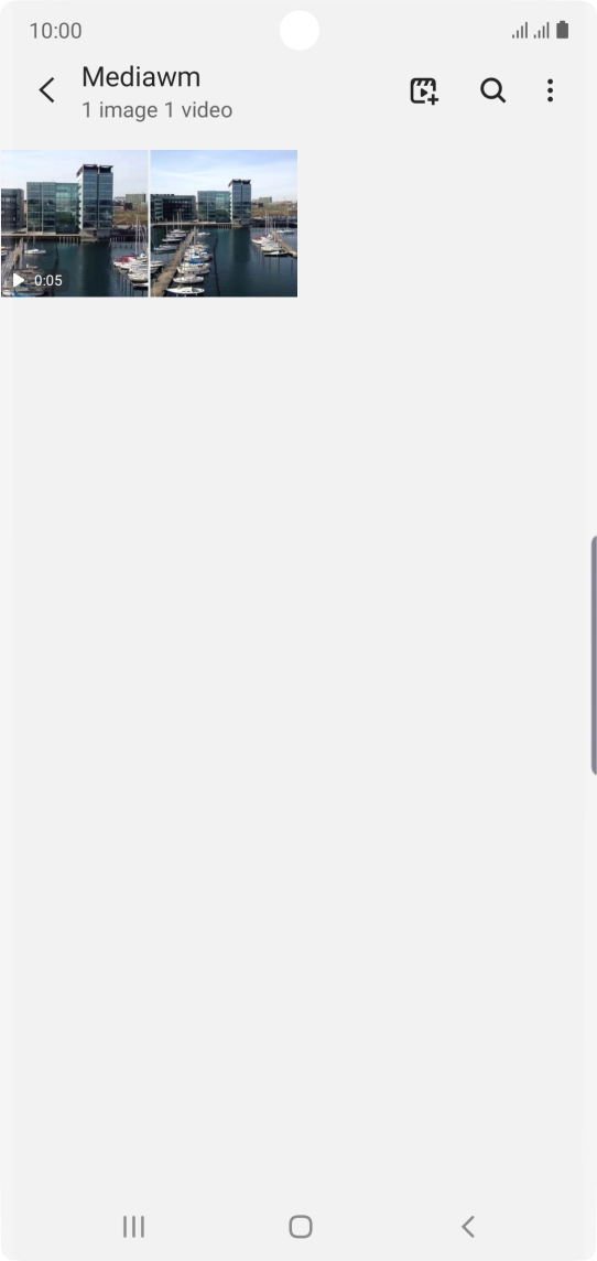 Press and hold any picture or video clip.