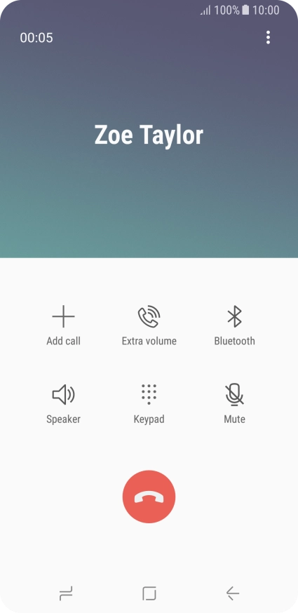 Press the end call icon.