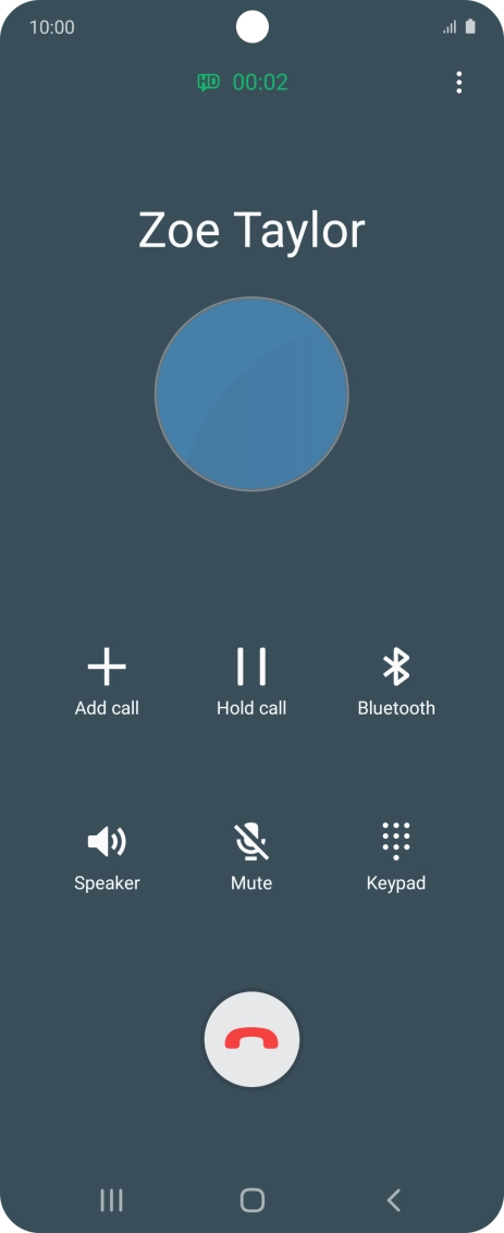 Press the end call icon.
