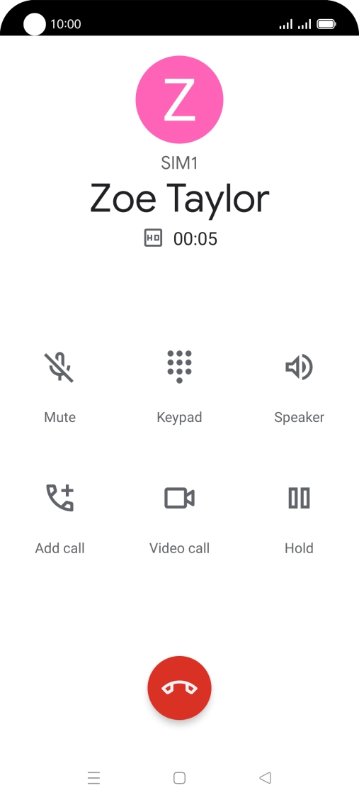 Press the end call icon.