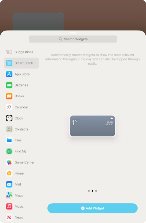 Slide your finger right or left on the screen to select the required widget size.