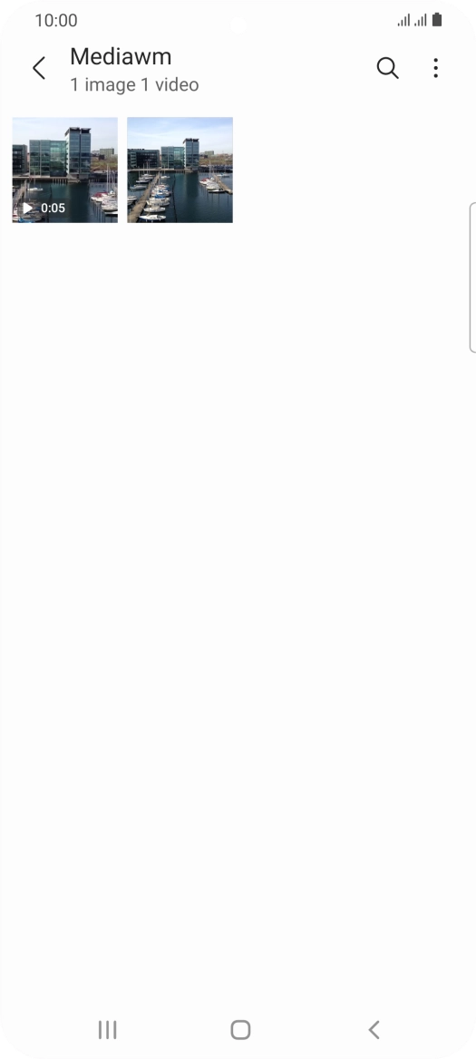 Press and hold any picture or video clip.