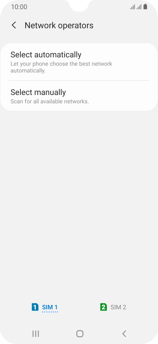 Press Select manually and your phone will search for networks.