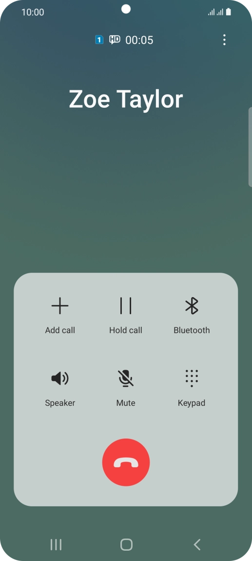 Press the end call icon.