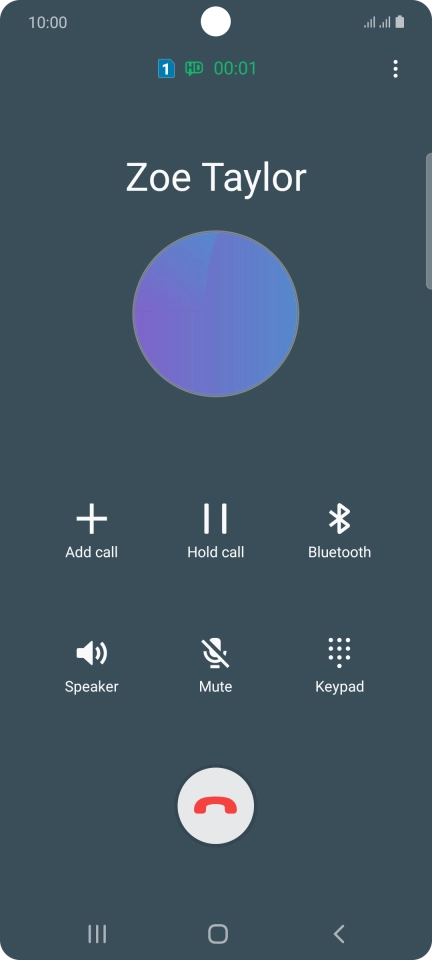 Press the end call icon.