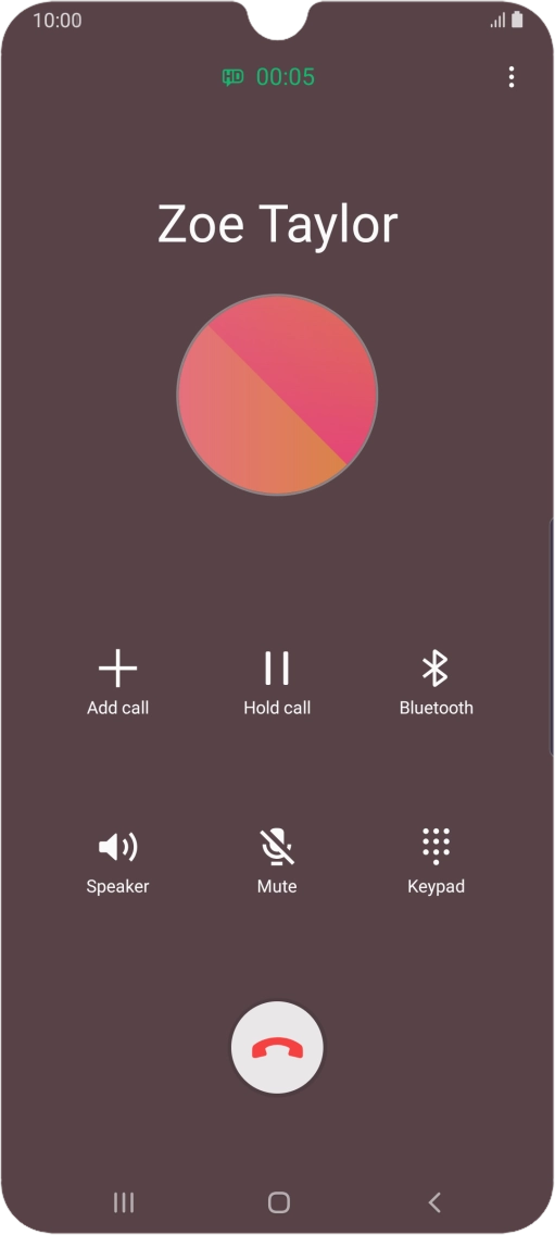 Press the end call icon.