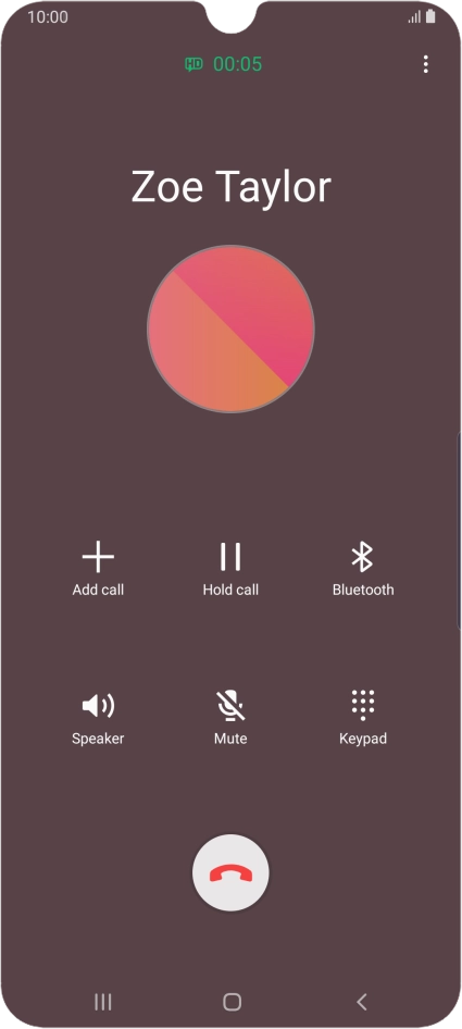 Press the end call icon.