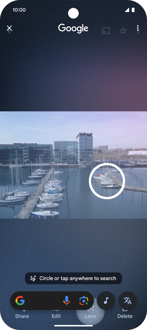 Draw a circle around the required object on the picture and wait for the search results.