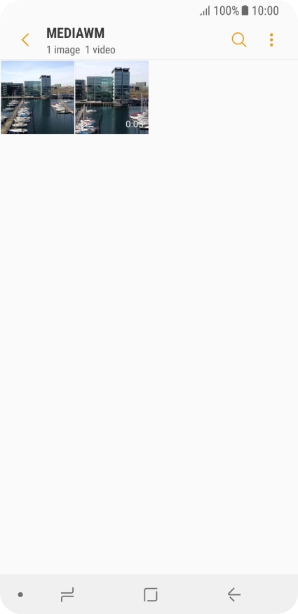 Press and hold any picture or video clip.