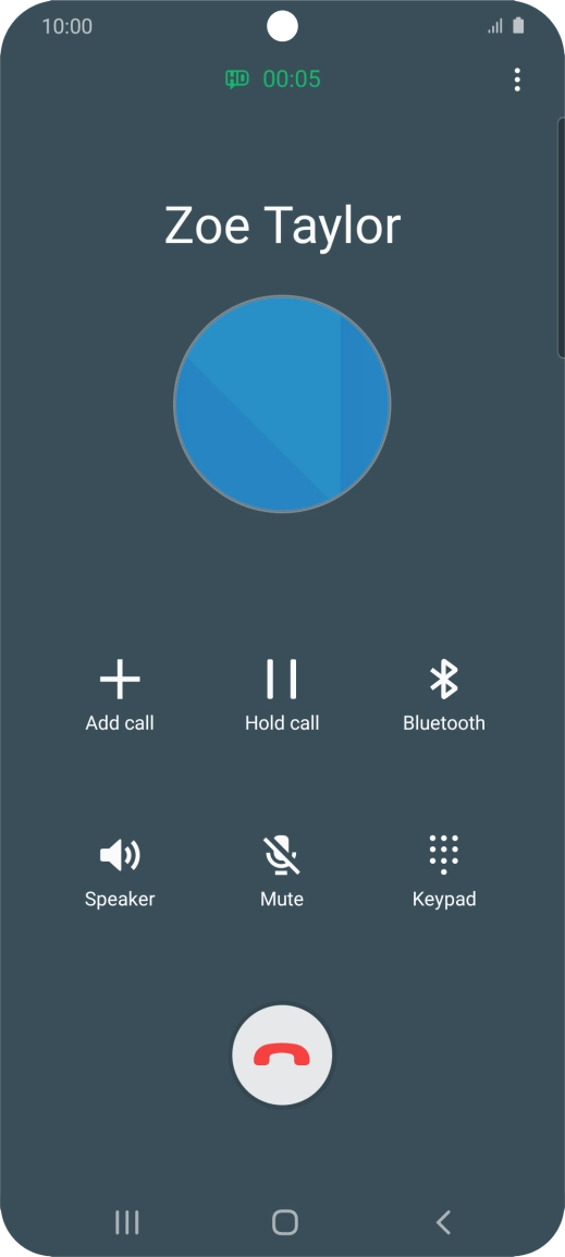 Press the end call icon.