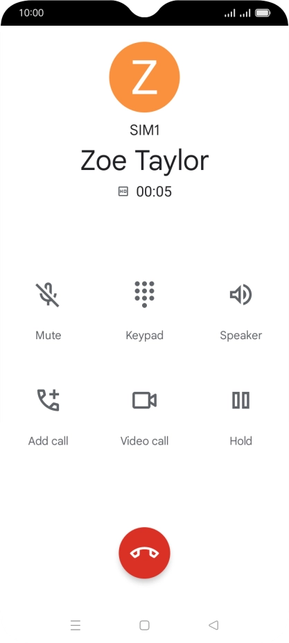Press the end call icon.