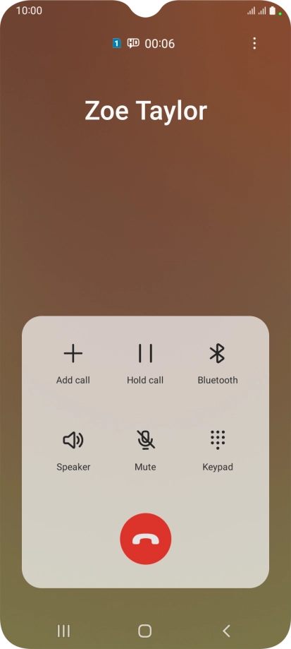 Press the end call icon.