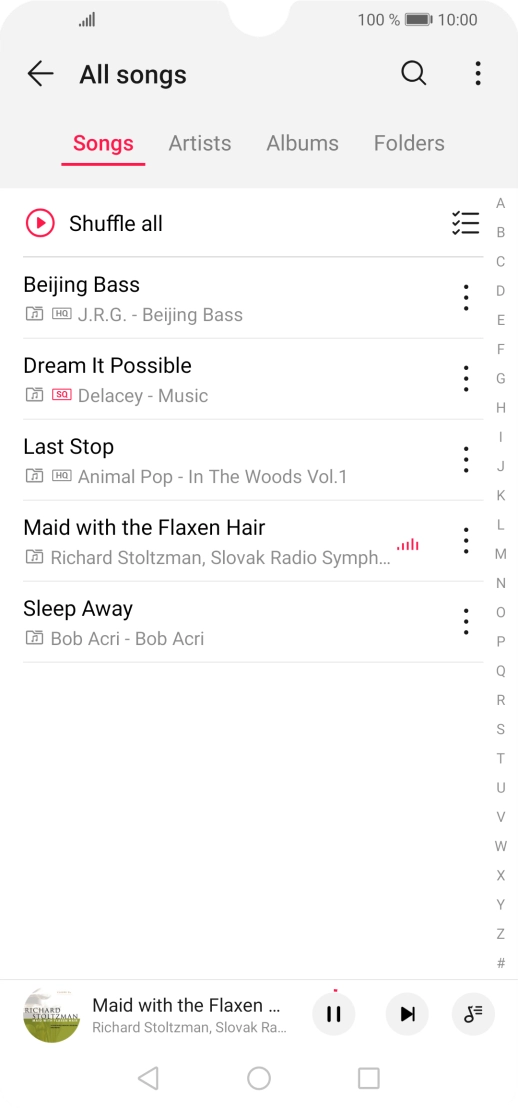 Press the song title at the bottom of the screen.